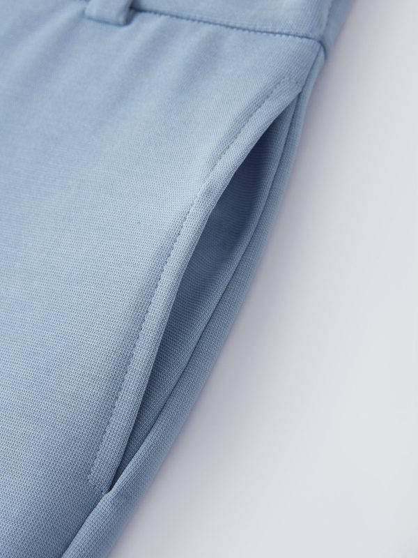 Wrinkle-Resistant High Rise Flared Trousers with Pockets